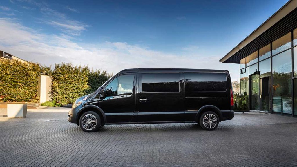 black-sprinter-in-front-of-luxury-venue